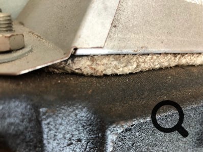 Asbestos seal 6 on Netaheat flue hood.