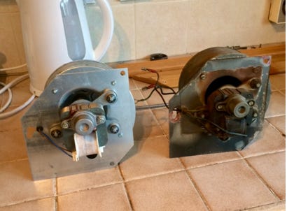 Two Potterton Netaheat combustion air fans, view of the backs showing the motors